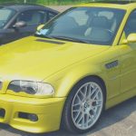 A yellow BMW M3 E46