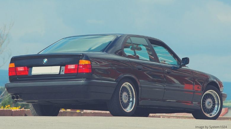 A black BMW E34 5-Series