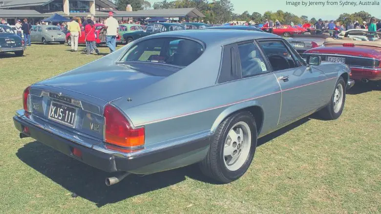 A blue Jaguar XJS at a car show