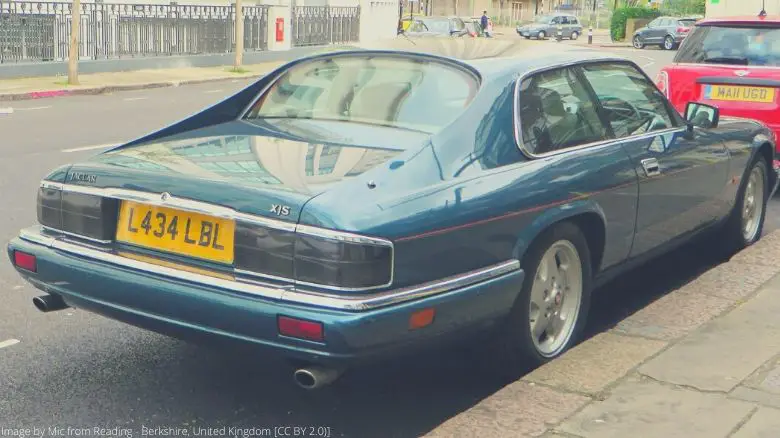 The rear of a green Jaguar XJS