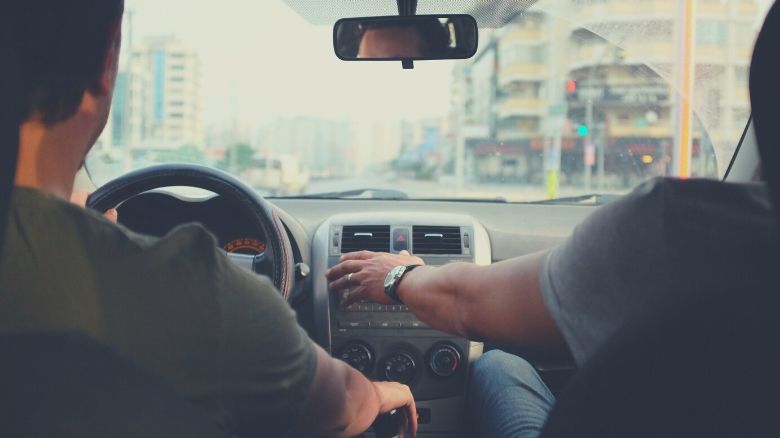 A man taking a car for a test drive