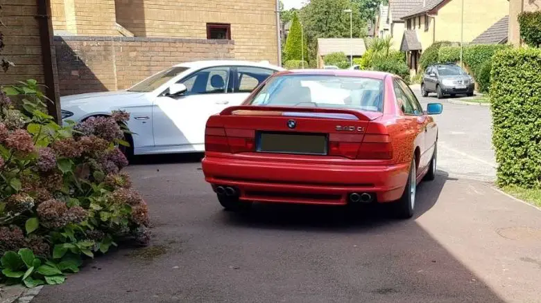 BMW 840 on a driveway