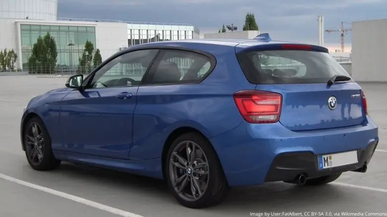 A blue BMW 1 Series hatchback