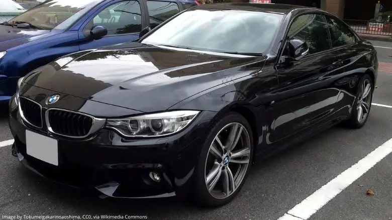 A black BMW 4 Series coupe