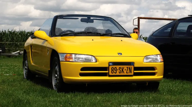 A yellow Honda Beat