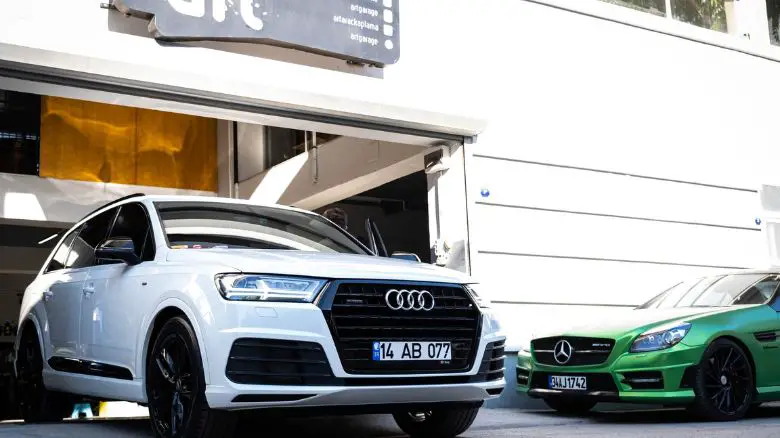 An Audi and Mercedes outside an independent garage