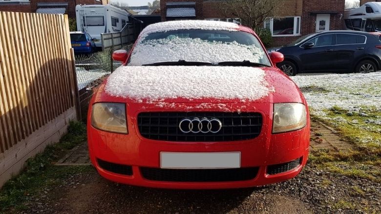 An Audi TT in light snow