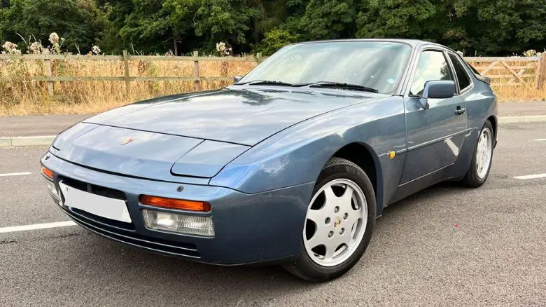 A blue Porsche 944 S2