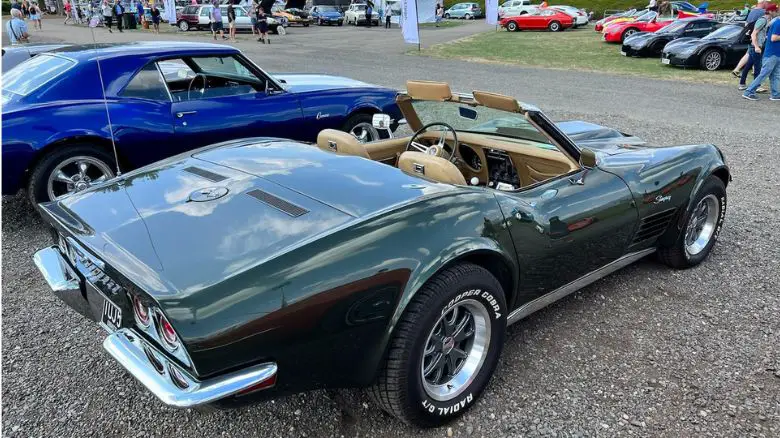 A green Chevrolet Corvette convertible