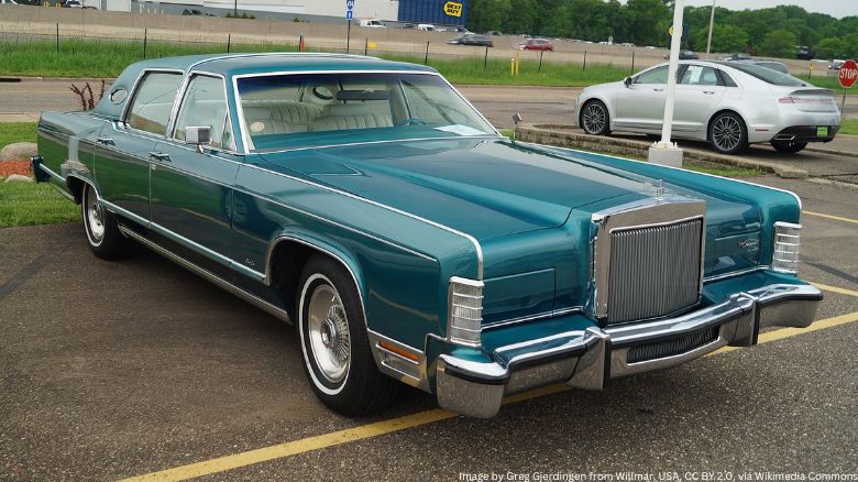 A green Lincoln Continental fifth generation