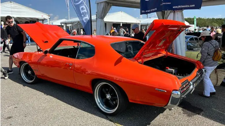 An orange Pontiac GTO