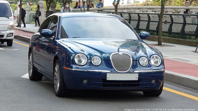 A blue Jaguar S-Type