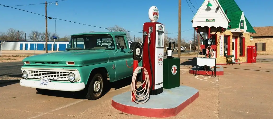 Classic car at petrol station